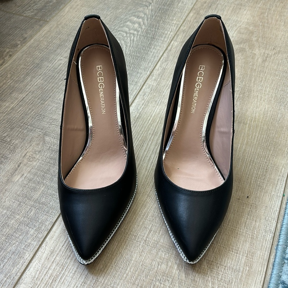 Classic black heels with silver accents